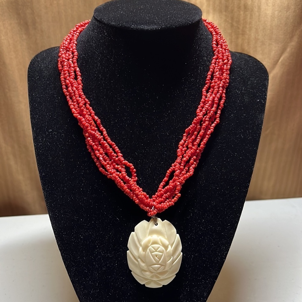 Vintage Red Beaded Necklace with Hand Carved White Pendant